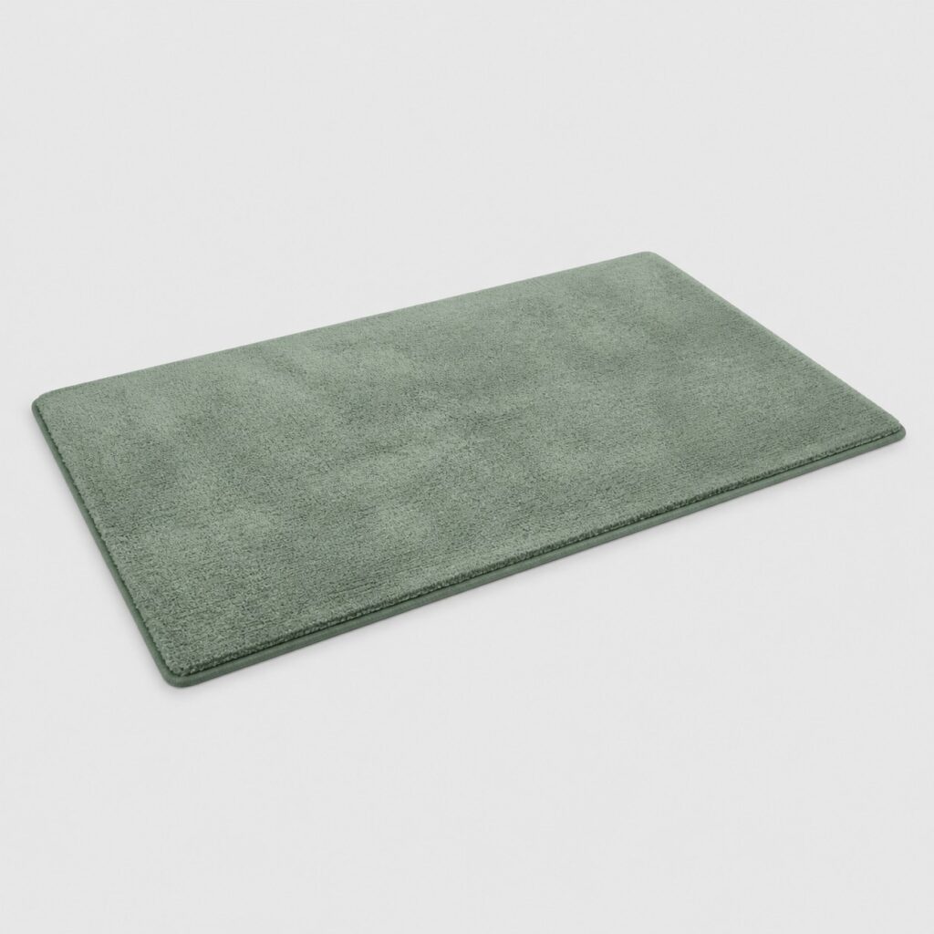 Grand tapis de bain en microfibre vert eucalyptus sur fond gris clair